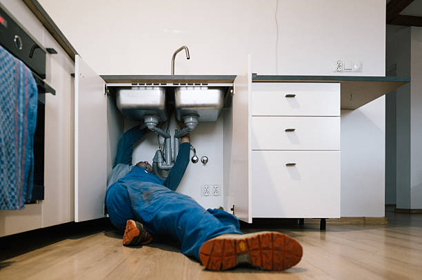 Professional Drain Cleaning technician working in Elwood, NY